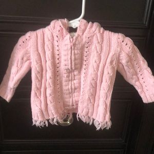 Pink cable knit sweater